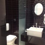 Banheiro por Arquiteto em Motel
